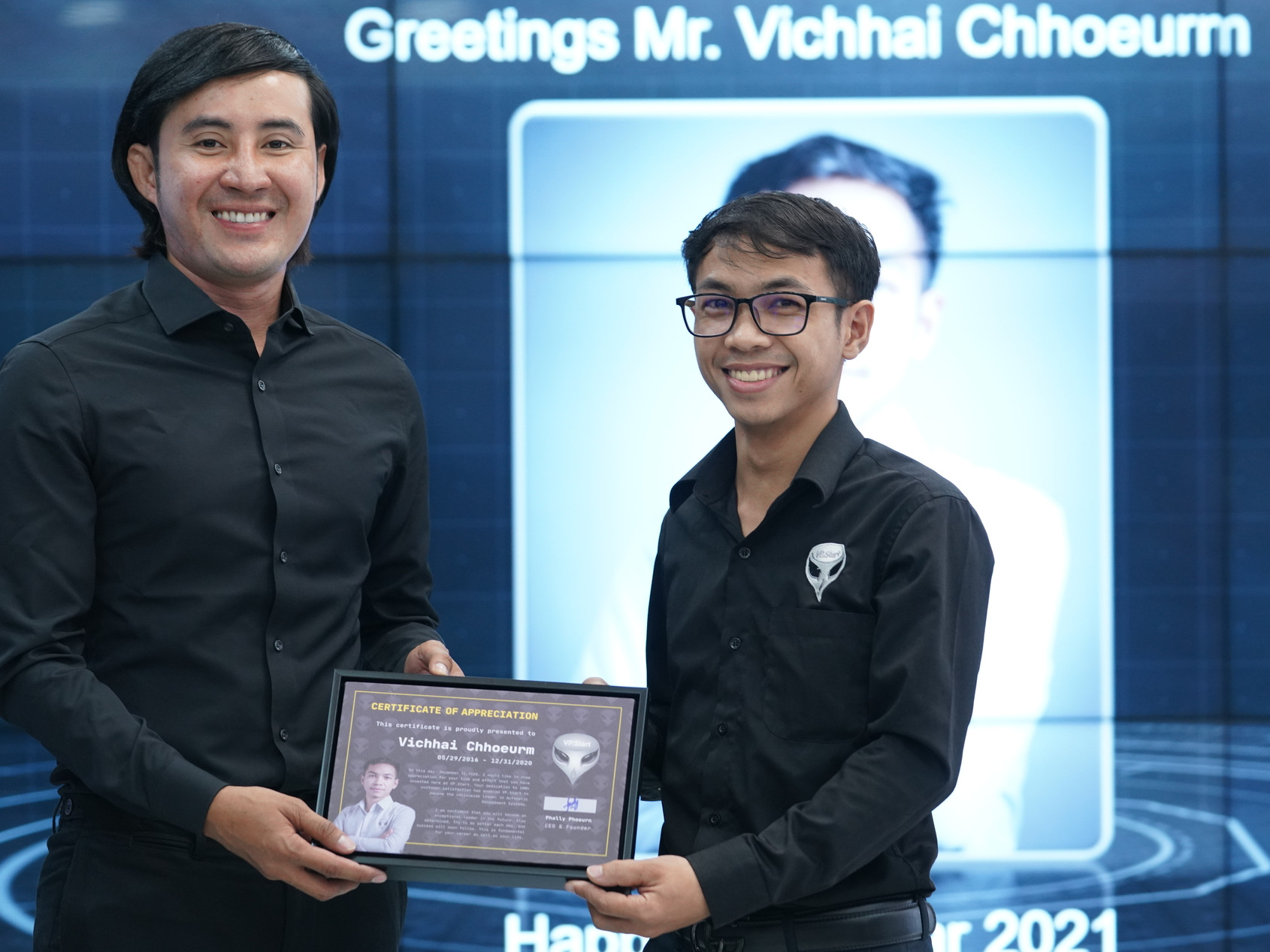 VP. Start employee receiving appreciation award from CEO Phoeurn Phally 